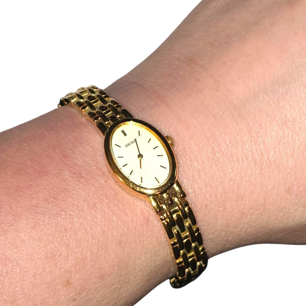 Seiko Women Watch V400-1019 Gold Tone Oval White Dial Link Bracelet Band WORKING